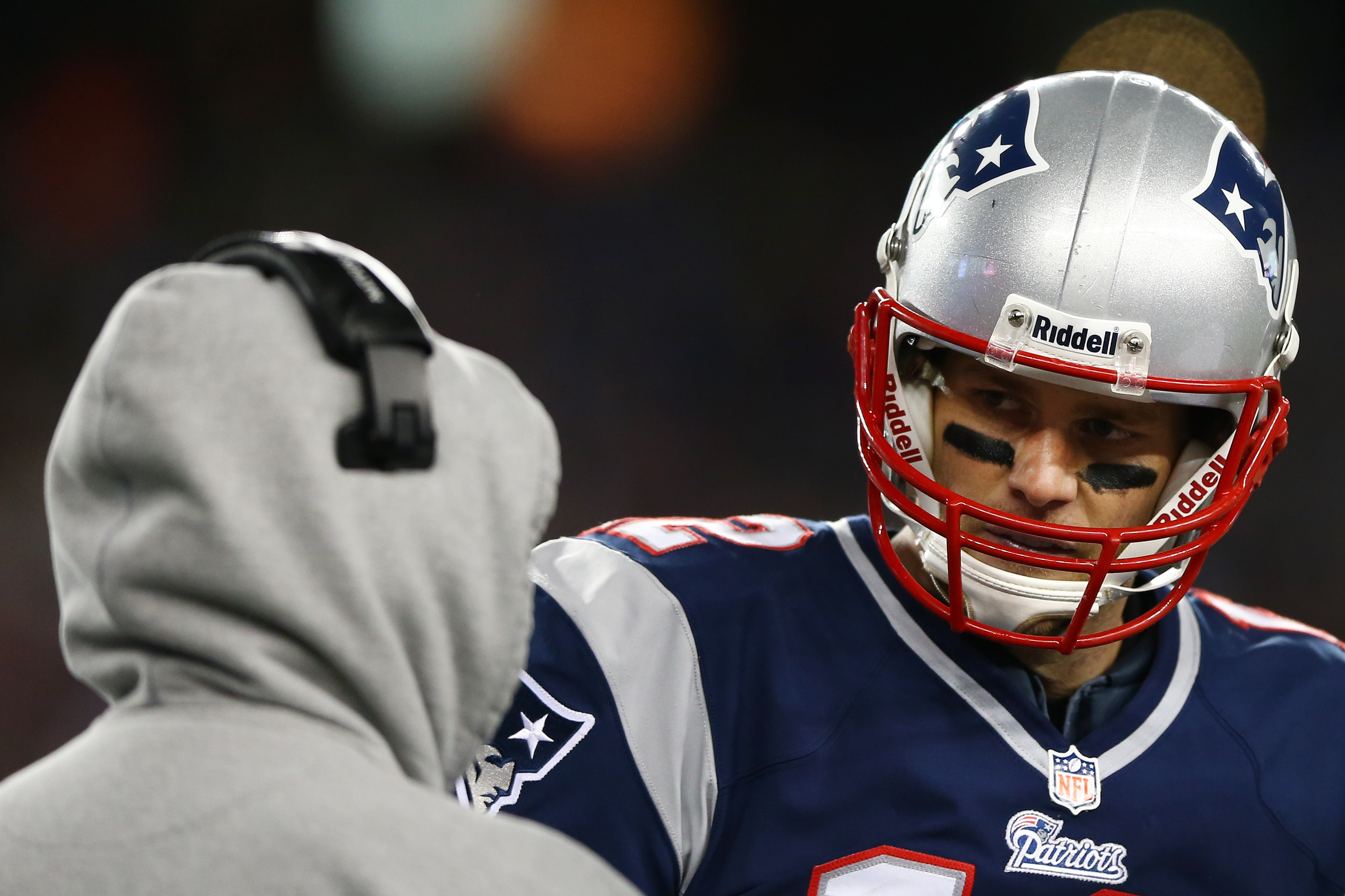 FOXBORO, MA - JANUARY 20:  Tom Brady #12 talks with head coach Bill Belichick of the New England Patriots against the Baltimore Ravens during the 2013 AFC Championship game at Gillette Stadium on January 20, 2013 in Foxboro, Massachusetts.  (Photo by Elsa/Getty Images)