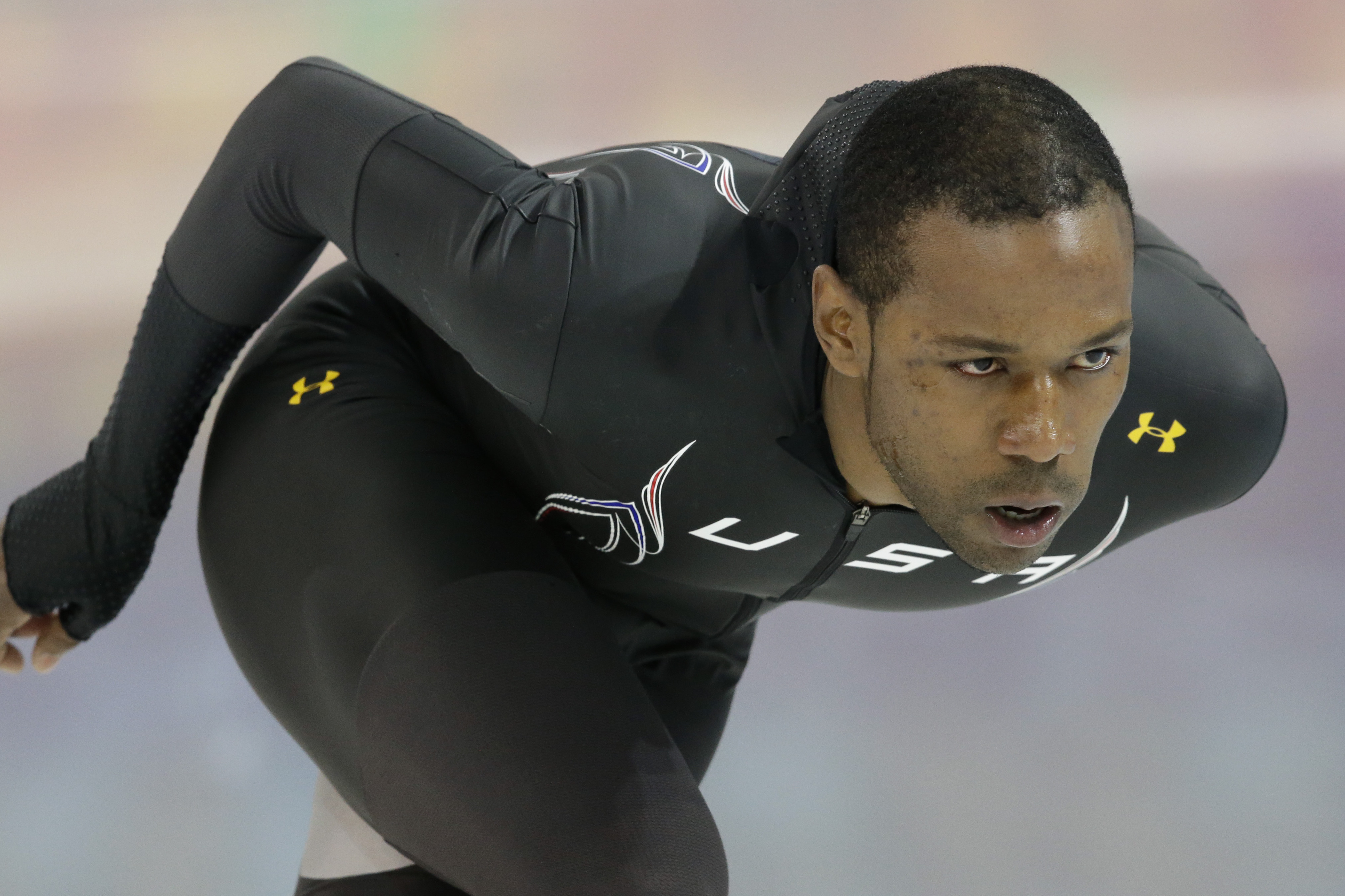 Speedskater Shani Davis of the U.S. trains at the Adler Arena Skating Center during the 2014 Winter Olympics in Sochi, Russia, Wednesday, Feb. 5, 2014. (AP Photo/Patrick Semansky)