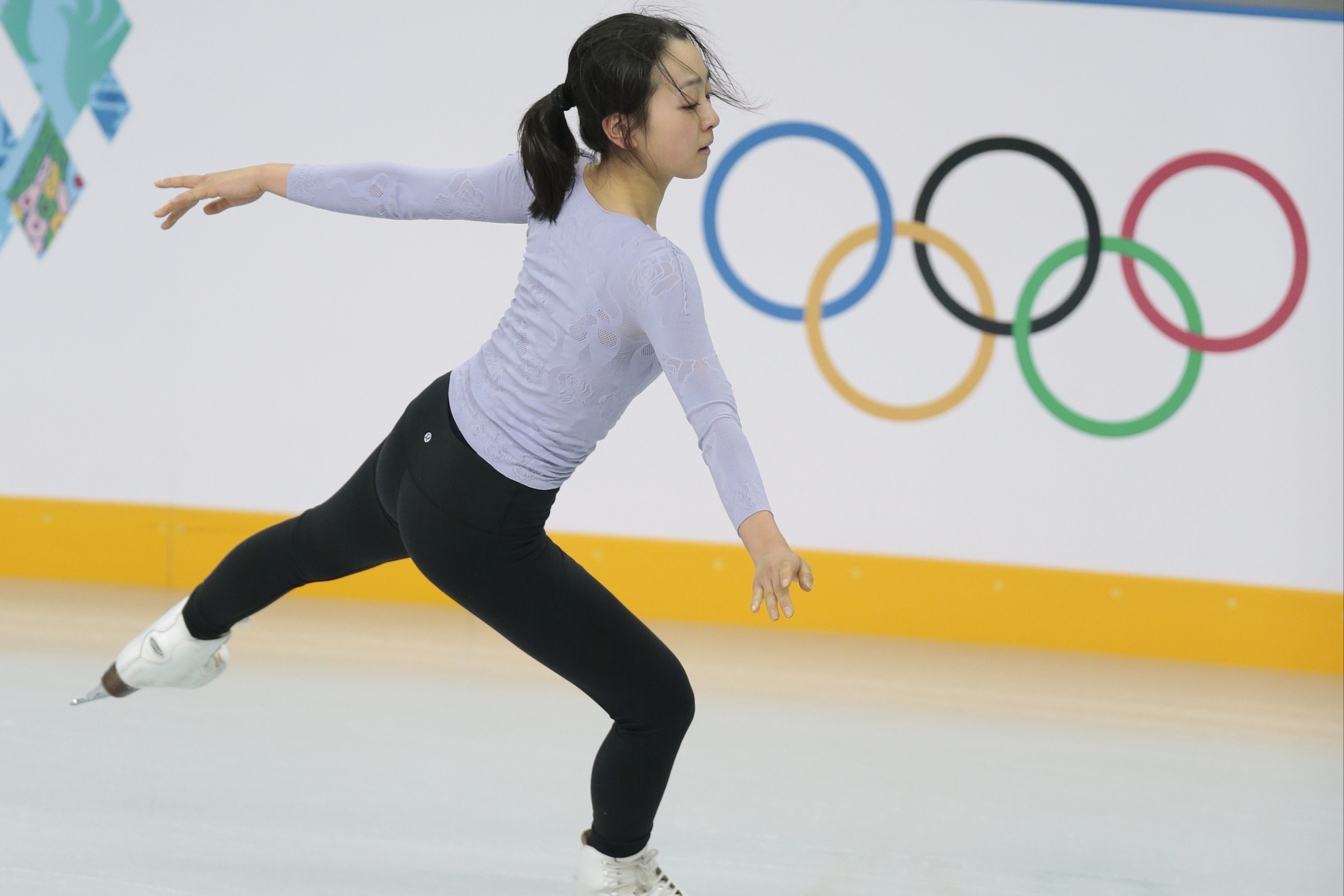 Japan's Asada Mao skates at the figure stating practice rink ahead of the 2014 Winter Olympics, Thursday, Feb. 6, 2014, in Sochi, Russia. (AP Photo/Ivan Sekretarev)