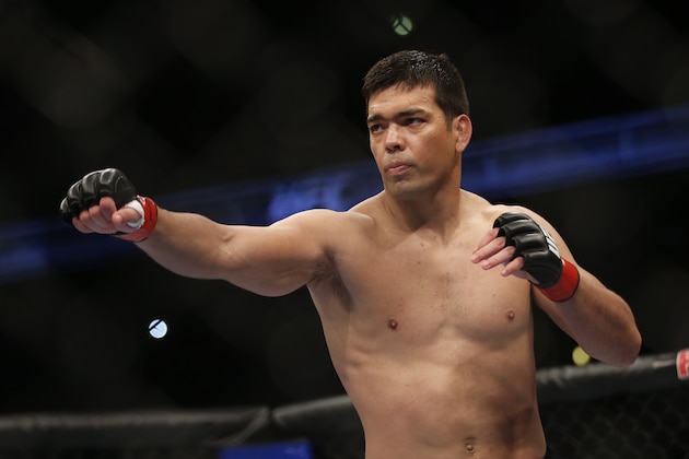Lyoto Machida Dan Henderson during their UFC 157 light heavyweight mixed martial arts match in Anaheim, Calif., Saturday, Feb. 23, 2013. Machida won by split decision after the third round. (AP Photo/Jae C. Hong)