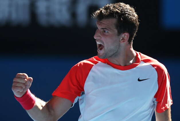 Grigor Dimitrov of Bulgaria celebrates a point won against Rafael Nadal of Spain during their quarterfinal at the Australian Open tennis championship in Melbourne, Australia, Wednesday, Jan. 22, 2014.(AP Photo/Aaron Favila)