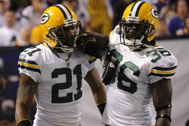 Green Bay Packers cornerback Charles Woodson (21) and safety Nick Collins (36) celebrate a fumble recovery by the Minnesota Vikings during the first half of an NFL football game Sunday, Nov. 21, 2010, in Minneapolis. (AP Photo/Hannah Foslien) Green Bay Packers cornerback Charles Woodson (21) and safety Nick Collins (36) celebrate a fumble recovery by the Minnesota Vikings during the first half of an NFL football game Sunday, Nov. 21, 2010, in Minneapolis. (AP Photo/Hannah Foslien)