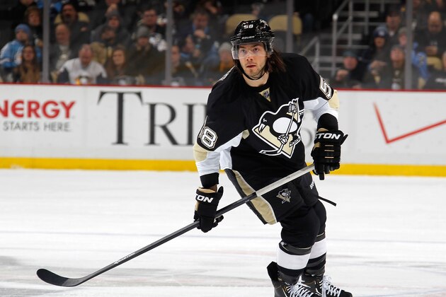PITTSBURGH, PA - JANUARY 27:  Kris Letang #58 of the Pittsburgh Penguins skates against the Buffalo Sabres on January 27, 2014 at Consol Energy Center in Pittsburgh, Pennsylvania.  (Photo by Gregory Shamus/NHLI via Getty Images)