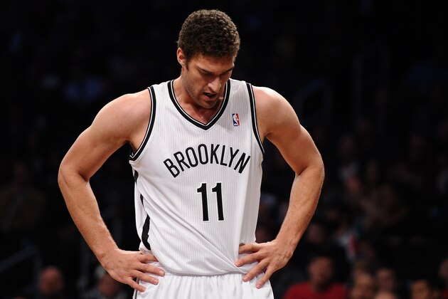 NEW YORK, NY - DECEMBER 12:  Brook Lopez #11 of the Brooklyn Nets looks on during the first half against the Los Angeles Clippers at Barclays Center on December 12, 2013 in the Brooklyn borough of New York City. NOTE TO USER: User expressly acknowledges and agrees that, by downloading and/or using this photograph, user is consenting to the terms and conditions of the Getty Images License Agreement.  (Photo by Maddie Meyer/Getty Images)