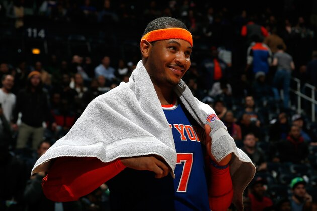 ATLANTA, GA - NOVEMBER 13:  Carmelo Anthony #7 of the New York Knicks reacts in the final seconds of their 95-91 win over the Atlanta Hawks at Philips Arena on November 13, 2013 in Atlanta, Georgia.  NOTE TO USER: User expressly acknowledges and agrees that, by downloading and or using this photograph, User is consenting to the terms and conditions of the Getty Images License Agreement.  (Photo by Kevin C. Cox/Getty Images)