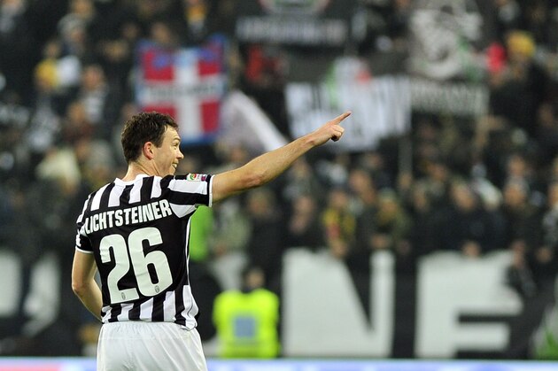 Juventus defender Stephan Lichtsteiner, of Switzerland, celebrates after scoring during a Serie A soccer match between Juventus and Inter Milan at the Juventus stadium, in Turin, Italy, Sunday, Feb. 2, 2014. (AP Photo/Massimo Pinca)