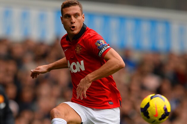 LONDON, ENGLAND - DECEMBER 01:  Nemanja Vidic of Manchester United on the ball during the Barclays Premier League Match between Tottenham Hotspur and Manchester United at White Hart Lane on December 1, 2013 in London, England.  (Photo by Michael Regan/Getty Images)
