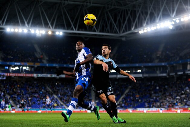 BARCELONA, SPAIN - JANUARY 18:  Jhon Cordoba (L) of RCD Espanyol Jonny Castro of RC Celta de Vigo during the La Liga match between RCD Espanyol and RC Celta de Vigo at Cornella-El Prat Stadium on January 18, 2014 in Barcelona, Spain.  (Photo by David Ramos/Getty Images)
