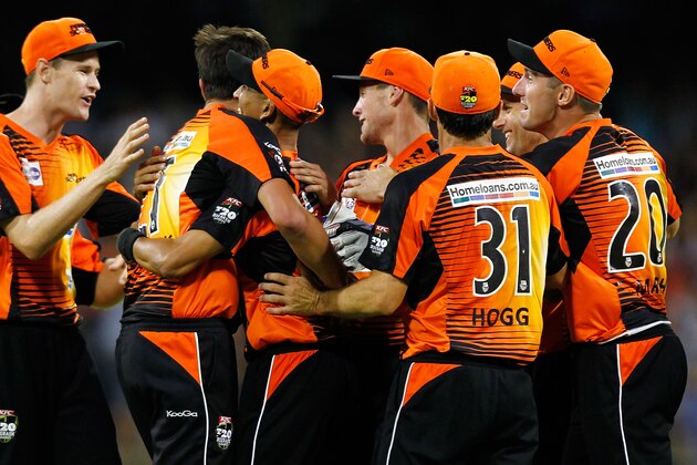 PERTH, AUSTRALIA - FEBRUARY 07:  Alfonso Thomas of the Perth Scorchers celebrates after taking a catch to dismiss George Bailey of the Hobart Hurricanes  during the Big Bash League Final match between the Perth Scorchers and the Hobart Hurricanes at WACA on February 7, 2014 in Perth, Australia.  (Photo by Will Russell/Getty Images)