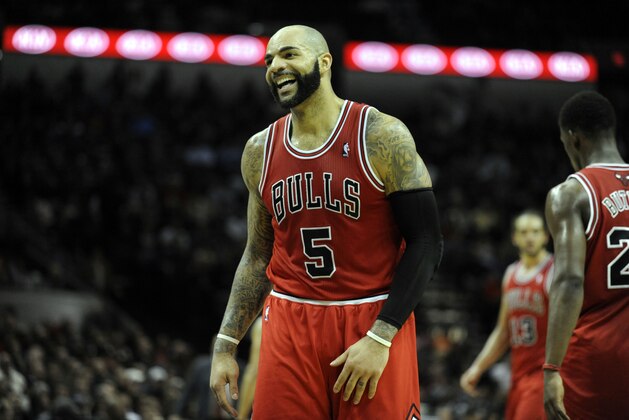 Jan 29, 2014; San Antonio, TX, USA; Chicago Bulls forward Carlos Boozer (5) reacts against the San Antonio Spurs during the second half at the AT&T Center. Chicago beat San Antonio 96-86. Mandatory Credit: Brendan Maloney-USA TODAY Sports