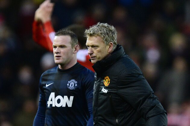 STOKE ON TRENT, ENGLAND - FEBRUARY 01:  David Moyes, manager of Manchester United walks off with Wayne Rooney after the Barclays Premier League match between Stoke City and Manchester United at Britannia Stadium on February 1, 2014 in Stoke on Trent, England.  (Photo by Jamie McDonald/Getty Images)