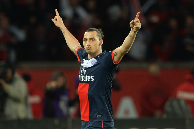 PARIS, FRANCE - MAY 18:  Zlatan Ibrahimovic of PSG celebrates after scoring to make it 3-0 during the Ligue 1 match between Paris Saint-Germain FC and Stade Brestois 29 at Parc des Princes on May 18, 2013 in Paris, France.  (Photo by Michael Regan/Getty Images)