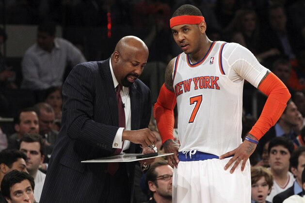 New York Knicks head coach Mike Woodson, left, gives Carmelo Anthony instruction in the second half of Game 2 of their NBA basketball playoff series in the Eastern Conference semifinals against the Indiana Pacers at Madison Square Garden in New York, Tuesday, May 7, 2013. The Knicks won 105-79. (AP Photo/Mary Altaffer)