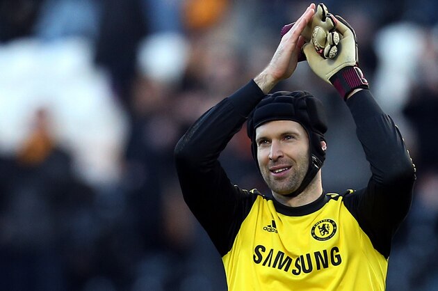 Chelsea's goalkeeper Petr Cech celebrates at the end of their English Premier League soccer match against Hull City at the KC Stadium, Hull, England, Saturday, Jan. 11, 2014. (AP Photo/Scott Heppell)