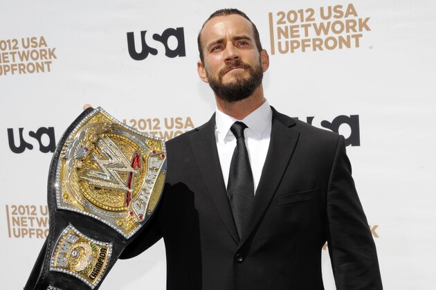 WWE wrestler CM Punk attends the USA network upfront presentation at Alice Tully Hall, Thursday, May 17, 2012 in New York. (AP Photo/Evan Agostini)