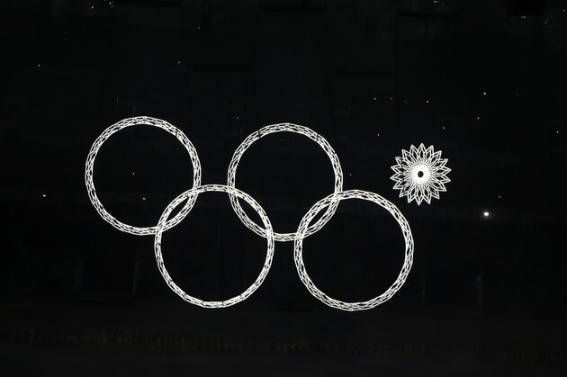 One of the rings forming the Olympic Rings fail to open during the opening ceremony of the 2014 Winter Olympics in Sochi, Russia, Friday, Feb. 7, 2014. (AP Photo/Charlie Riedel)