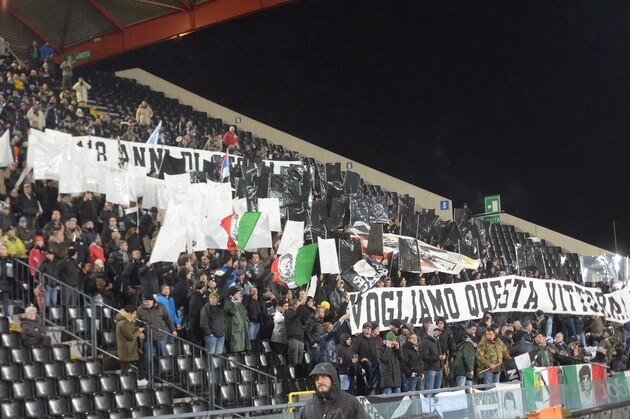 UDINE, ITALY - FEBRUARY 04: Udinese fans shows their support during the TIM Cup match between Udinese Calcio and ACF Fiorentina at Stadio Friuli on February 4, 2014 in Udine, Italy.  (Photo by Dino Panato/Getty Images)