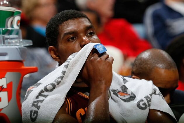 ATLANTA, GA - DECEMBER 06:  Andrew Bynum #21 of the Cleveland Cavaliers reacts in the final minutes of their 108-89 loss to the Atlanta Hawks at Philips Arena on December 6, 2013 in Atlanta, Georgia.  NOTE TO USER: User expressly acknowledges and agrees that, by downloading and or using this photograph, User is consenting to the terms and conditions of the Getty Images License Agreement.  (Photo by Kevin C. Cox/Getty Images)