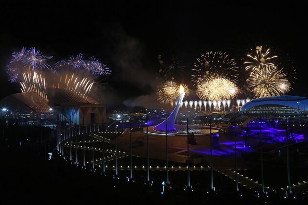 Fireworks are seen over the Olympic Park during the opening ceremony of the 2014 Winter Olympics in Sochi, Russia, Friday, Feb. 7, 2014. (AP Photo/Julio Cortez)