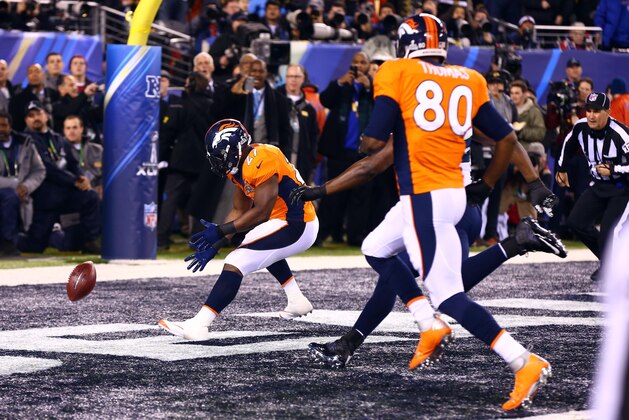 Feb 2, 2014; East Rutherford, NJ, USA; Denver Broncos running back Knowshon Moreno (27) recovers a fumble in the end zone for a safety against the Seattle Seahawks in the first quarter in Super Bowl XLVIII at MetLife Stadium.  Mandatory Credit: Mark J. Rebilas-USA TODAY Sports