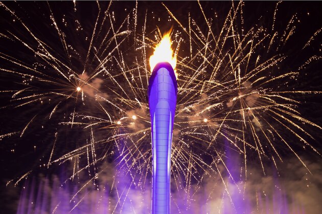 The Olympic flame is lit during the opening ceremony of the 2014 Winter Olympics in Sochi, Russia, Friday, Feb. 7, 2014. (AP Photo/Bernat Armangue)
