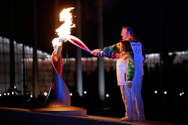 SOCHI, RUSSIA - FEBRUARY 07:  Irina Rodnina and Vladislav Tretyak light the Olympic cauldron during the opening ceremony of the 2014 Winter Olympics in Sochi, Russia, Friday, Feb. 7, 2014.   (Photo by Matt Slocum - Pool/Getty Images)