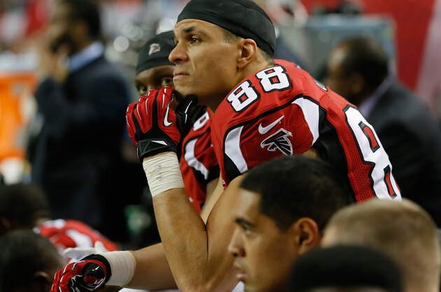 ATLANTA, GA - DECEMBER 29:  Tony Gonzalez #88 of the Atlanta Falcons sits on the bench in the final minutes of their 21-20 loss to the Carolina Panthers at Georgia Dome on December 29, 2013 in Atlanta, Georgia.  (Photo by Kevin C. Cox/Getty Images)