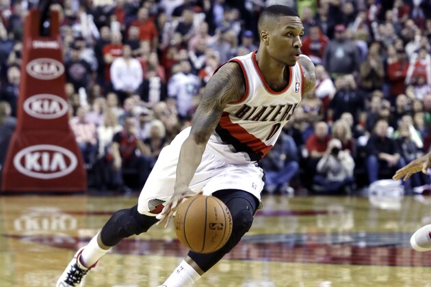 Portland Trail Blazers guard Damian Lillard is shown during the second half of an NBA basketball game against the Toronto Raptors in Portland, Ore., Saturday, Feb. 1, 2014.(AP Photo/Don Ryan)