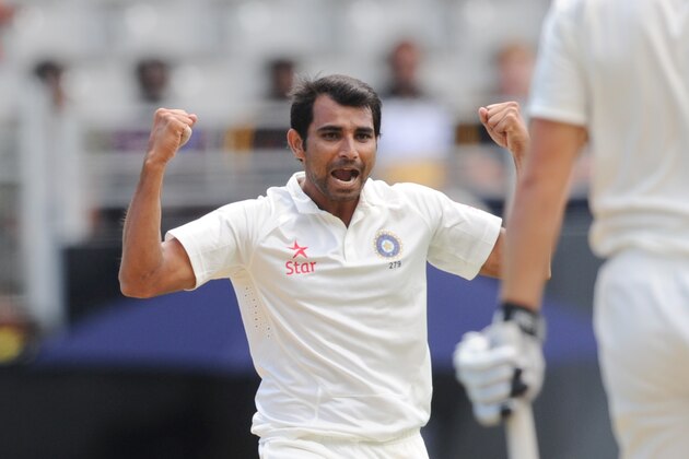 India’s Mohammed Shami claims the wicket of New Zealand’s Peter Fulton for 5 on the 3rd day of the 1st cricket test, Eden Park, Auckland, New Zealand, Saturday, Feb. 8, 2014. (AP Photo/SNPA, Ross Setford) NEW ZEALAND OUT