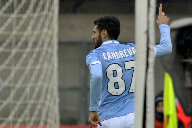 Lazio's Antonio Candreva celebrates after scoring a goal during their Serie A soccer match against Chievo, at Verona's Bentegodi stadium, Italy, Sunday, Feb. 2, 2014. (AP Photo/Marco Vasini)