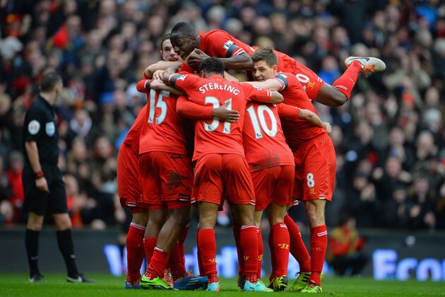LIVERPOOL, ENGLAND - FEBRUARY 08:  Daniel Sturridge of Liverpool celebrates with his team-mates after scoring the fourth goal during the Barclays Premier League match between Liverpool and Arsenal at Anfield on February 8, 2014 in Liverpool, England.  (Photo by Michael Regan/Getty Images)