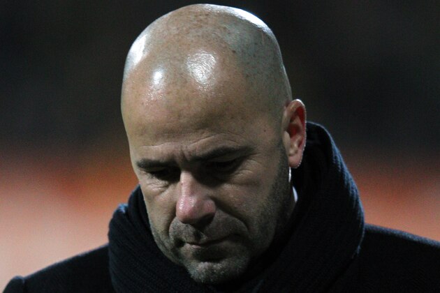 VENLO, NETHERLANDS - FEBRUARY 25:  Heracles Manager/Trainer Peter Bosz looks dejected as he is sent off by referee Kevin Blom during the Eredivisie match between VVV Venlo and SC Heracles Almelo at Seacon Stadium De Koel on February 25, 2012 in Venlo, Netherlands.  (Photo by Dean Mouhtaropoulos/Getty Images)