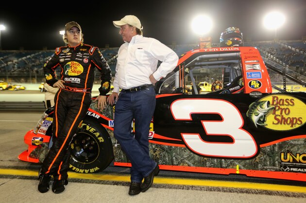 HOMESTEAD, FL - NOVEMBER 15:  (L-R) Ty Dillon, driver of the #3 Bass Pro Shops / Tracker Boats Chevrolet, poses with his grandfather and team owner Richard Childress on the grid prior to the NASCAR Camping World Truck Series Ford EcoBoost 200 at Homestead-Miami Speedway on November 15, 2013 in Homestead, Florida.  (Photo by Jerry Markland/Getty Images)