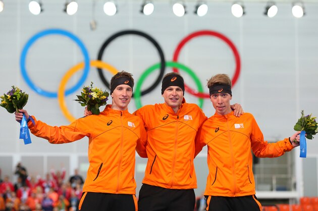 SOCHI, RUSSIA - FEBRUARY 08:  (L-R) Silver medalist Jan Blokhuijsen of the Netherlands, gold medalist Sven Kramer of the Netherlands and bronze medalist Jorrit Bergsma of the Netherlands on the podium during the flower ceremony for the Men's 5000m Speed Skating during day 1 of the Sochi 2014 Winter Olympics at Adler Arena Skating Center on February 8, 2014 in Sochi, Russia.  (Photo by Quinn Rooney/Getty Images)
