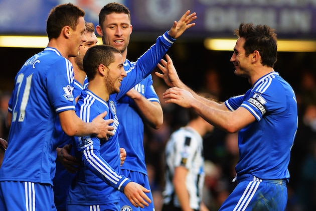 LONDON, ENGLAND - FEBRUARY 08:  Eden Hazard (2nd left) of Chelsea is congratulated by team mates including Frank Lampard (right) after scoring his third goal from the penalty spot during the Barclays Premier League match between Cheslea and Newcastle United at Stamford Bridge on February 8, 2014 in London, England.  (Photo by Shaun Botterill/Getty Images)