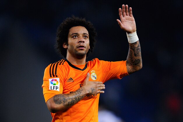 BARCELONA, SPAIN - JANUARY 12:  Marcelo Vieira of Real Madrid CF celebrates at the end of the La Liga match between RCD Espanyol and Real Madrid CF at Cornella-El Prat Stadium on January 12, 2014 in Barcelona, Spain.  (Photo by David Ramos/Getty Images)