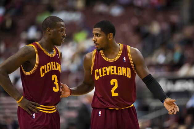 Oct 17, 2012; Philadelphia, PA, USA; Cleveland Cavaliers guard Kyrie Irving (2) talks with guard Dion Waiters (3) during the second quarter against the Philadelphia 76ers at the Wachovia Center. Mandatory Credit: Howard Smith-USA TODAY Sports