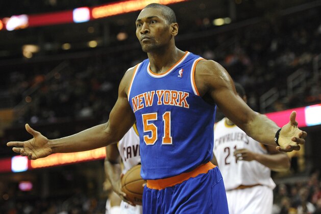 Dec 10, 2013; Cleveland, OH, USA; New York Knicks small forward Metta World Peace reacts in the first quarter against the Cleveland Cavaliers at Quicken Loans Arena. Mandatory Credit: David Richard-USA TODAY Sports