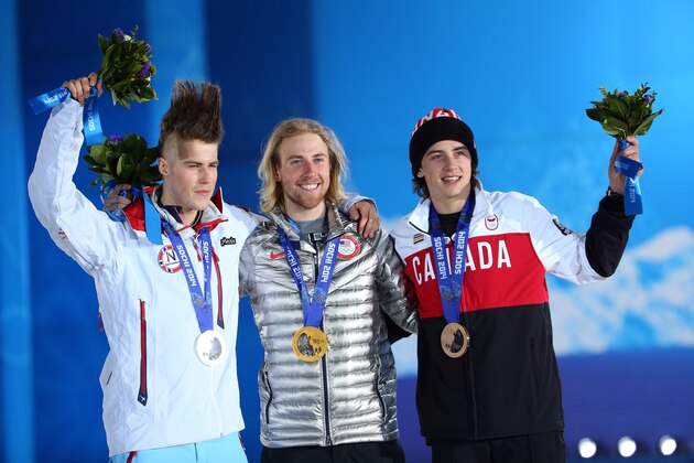 SOCHI, RUSSIA - FEBRUARY 08:  (L-R) Silver medalist Staale Sandbech of Norway, gold medalist Sage Kotsenburg of the United States and bronze medalist Mark McMorris of Canada on the podium during the medal ceremony for the for the Snowboard Men's Slopestyle during day 1 of the Sochi 2014 Winter Olympics at Medals Plaza on February 8, 2014 in Sochi, Russia.  (Photo by Quinn Rooney/Getty Images)