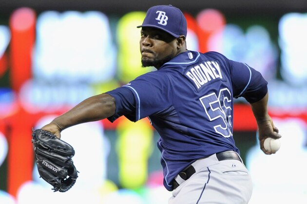MINNEAPOLIS, MN - SEPTEMBER 13: Fernando Rodney #56 of the Tampa Bay Rays delivers a pitch against the Minnesota Twins during the ninth inning of the game on September 13, 2013 at Target Field in Minneapolis, Minnesota. The Rays defeated the Twins 3-0. (Photo by Hannah Foslien/Getty Images)