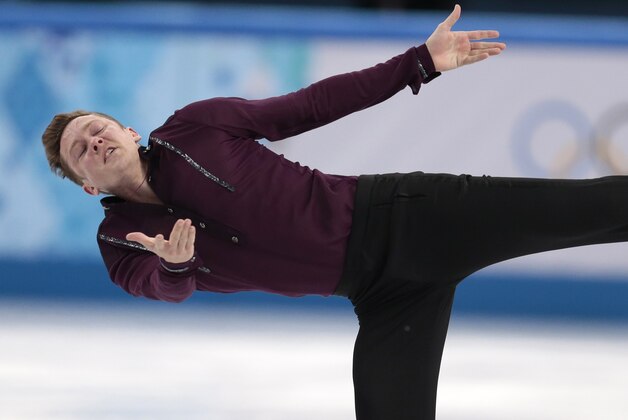 Jeremy Abbott of the United States competes in the men's team short program figure skating competition at the Iceberg Skating Palace during the 2014 Winter Olympics, Thursday, Feb. 6, 2014, in Sochi, Russia. (AP Photo/Ivan Sekretarev)