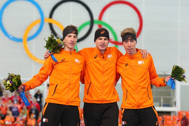 SOCHI, RUSSIA - FEBRUARY 08:  (L-R) Silver medalist Jan Blokhuijsen of the Netherlands, gold medalist Sven Kramer of the Netherlands and bronze medalist Jorrit Bergsma of the Netherlands on the podium during the flower ceremony for the Men's 5000m Speed Skating during day 1 of the Sochi 2014 Winter Olympics at Adler Arena Skating Center on February 8, 2014 in Sochi, Russia.  (Photo by Quinn Rooney/Getty Images)