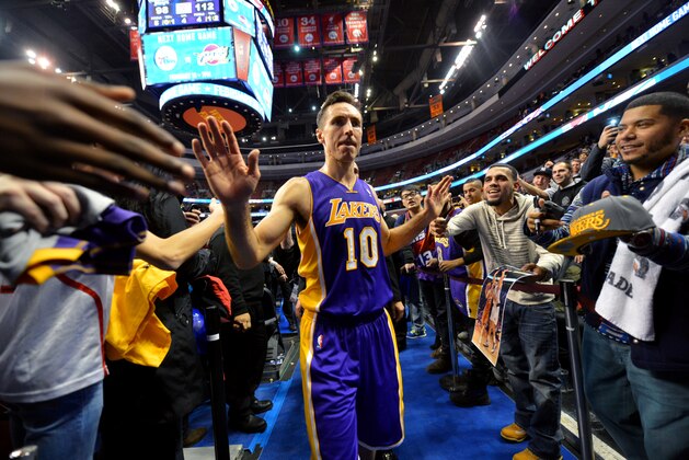 PHILADELPHIA, PA - FEBRUARY 7: Steve Nash #10 of the Los Angeles Lakers celebreates after the game against the Philadelphia 76ers at the Wells Fargo Center on February 7, 2014 in Philadelphia, Pennsylvania. NOTE TO USER: User expressly acknowledges and agrees that, by downloading and or using this photograph, User is consenting to the terms and conditions of the Getty Images License Agreement. Mandatory Copyright Notice: Copyright 2014 NBAE (Photo by Jesse D. Garrabrant/NBAE via Getty Images)