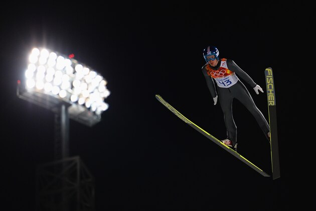 SOCHI, RUSSIA - FEBRUARY 08: Michael Hayboeck of Austria jumps during the Men's Normal Hill Individual Qualification on day 1 of the Sochi 2014 Winter Olympics at the RusSki Gorki Ski Jumping Center on February 8, 2014 in Sochi, Russia.  (Photo by Lars Baron/Getty Images)