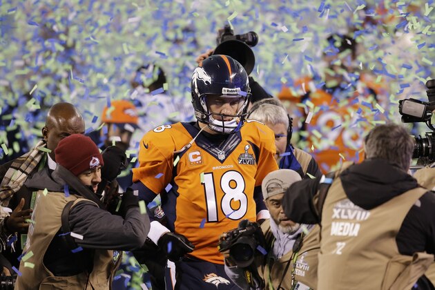 Denver Broncos quarterback Peyton Manning walks off the field after the Broncos lost to the Seattle Seahawks in the NFL Super Bowl XLVIII football game Sunday, Feb. 2, 2014, in East Rutherford, N.J. The Seahawks won 43-8. (AP Photo/Chris O'Meara)