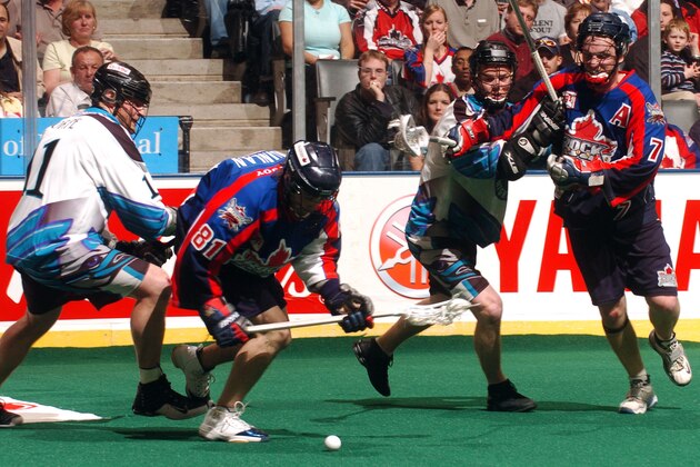 Rock Jimmy Quinlan looks for a lose ball in the second half of action between the Toronto Rock and Rochester Knighthawks in the NLL East Semi Final game at the Air Canada Centre, in Toronto Ontario Canada. (Photo by B. White/WireImage)