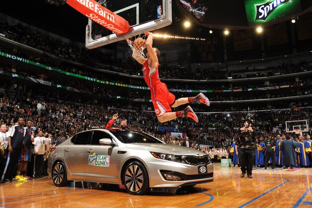 LOS ANGELES, CA - FEBRUARY 19:  Blake Griffin #32 of the Los Angeles Clippers dunks after jumping over a car during the Sprite Slam Dunk Contest at Staples Center on February 19, 2011 in Los Angeles, California. NOTE TO USER: User expressly acknowledges and agrees that, by downloading and/or using this Photograph, user is consenting to the terms and conditions of the Getty Images License Agreement. Mandatory Copyright Notice: Copyright 2011 NBAE (Photo by Andrew D. Bernstein/NBAE via Getty Images)