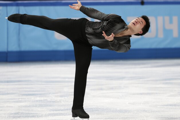 Patrick Chan of Canada competes in the men's team short program figure skating competition at the Iceberg Skating Palace during the 2014 Winter Olympics, Thursday, Feb. 6, 2014, in Sochi, Russia. (AP Photo/Bernat Armangue)