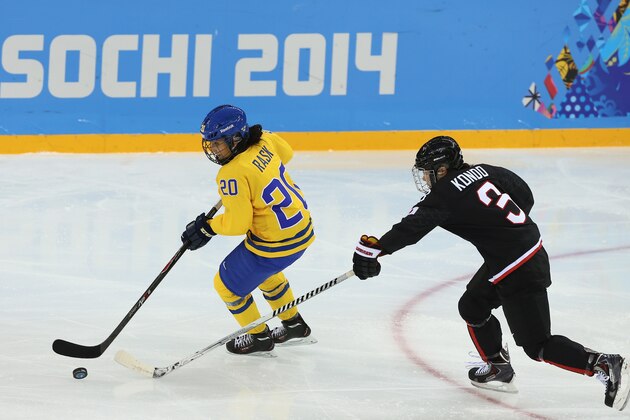SOCHI, RUSSIA - FEBRUARY 09:  Fanny Rask #20 of Sweden is pressured by Yoko Kondo #3 of Japan during the Women's Ice Hockey Preliminary Round Group B Game between Sweden and Japan on day 2 of the Sochi 2014 Winter Olympics at Shayba Arena on February 9, 2014 in Sochi, Russia.  (Photo by Robert Cianflone/Getty Images)