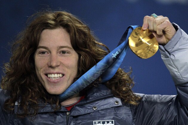 USA's gold medalist Shaun White reacts during the men's halfpipe medal ceremony at the Vancouver 2010 Olympics in Vancouver, British Columbia, Thursday, Feb. 18, 2010. (AP Photo/Jae C. Hong) USA's gold medalist Shaun White reacts during the men's halfpipe medal ceremony at the Vancouver 2010 Olympics in Vancouver, British Columbia, Thursday, Feb. 18, 2010. (AP Photo/Jae C. Hong)